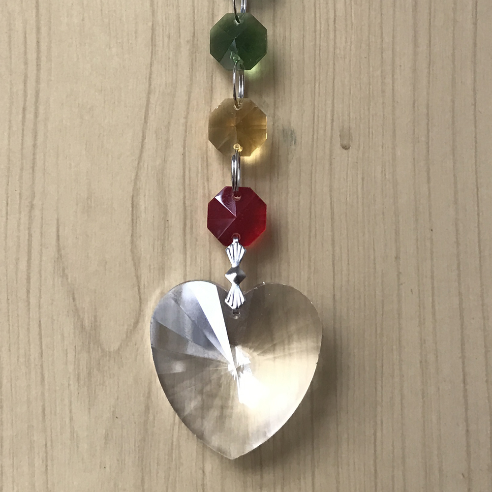 10 handmade K9 crystal glass chakra suncatcher prisms with rainbow effects, perfect as heart-shaped pendulum pendants for home decor