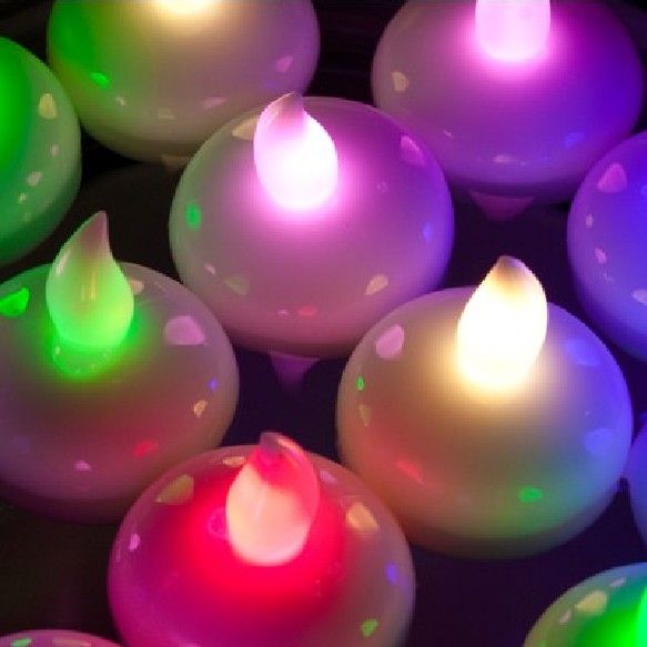 12-piece LED tea lights set with waterproof, color-changing, slow-flash floating candles for fish bowls, pools, vases, and crafts