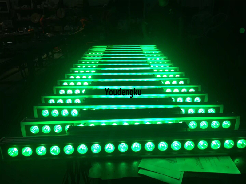 2 IP65-rated waterproof dual-head LED wall washers for outdoor use, featuring 18x15W RGBWA 5-in-1 linear LED bar lights