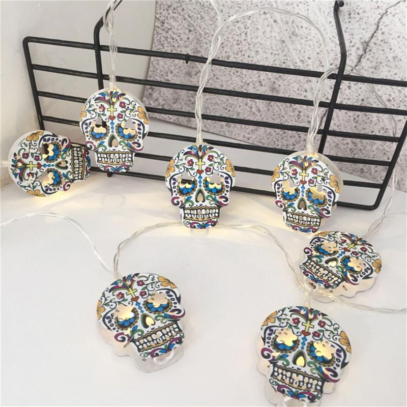 2Meter LED string lights with skull ornaments for Halloween, featuring 10 LEDs for festive home and party decor