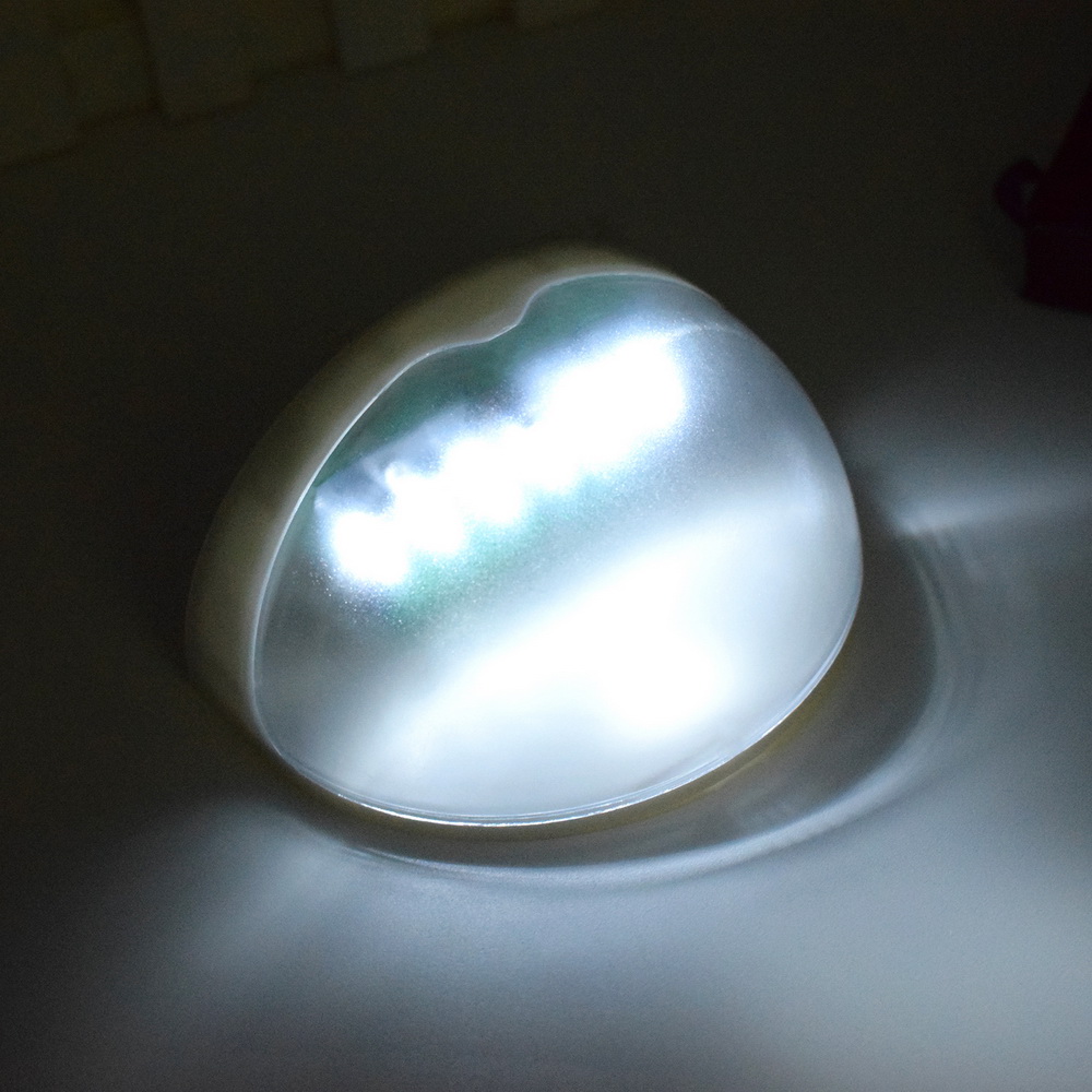 6 LED solar-powered waterproof outdoor wall light in warm white for gardens, streets, and fences