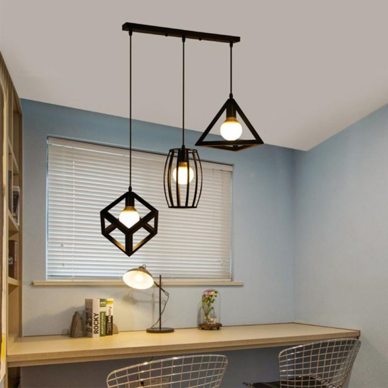A trio of vintage LED chandelier lamp covers with wrought iron industrial design, featuring stylish tree branch decor for home