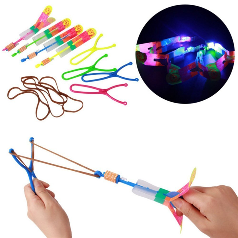 Amazing LED arrow rocket helicopter toy with rotating flight and light-up features, perfect for kids' parties and fun gifts