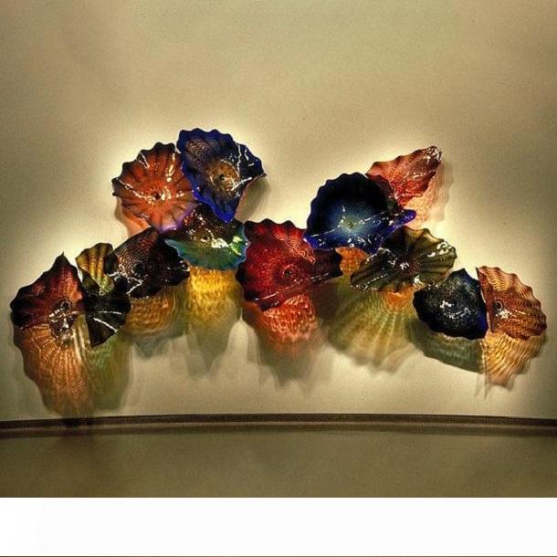 Antique handcrafted Murano glass wall plates and hanging lamps, perfect for wedding decor with complimentary shipping