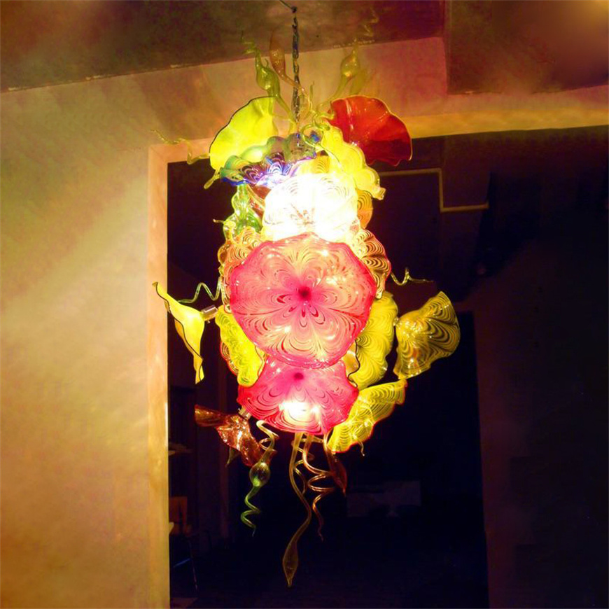 Art deco style pendant lamp featuring a floral plate design, handcrafted from blown glass, ideal for living room or home lighting with LED bulbs, inspired by Italian design