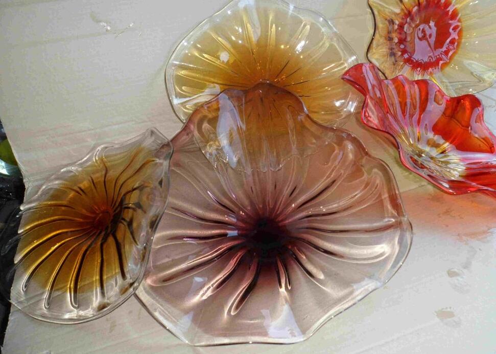 Artistic glass plates for vibrant home, hotel, restaurant, and villa lighting, featuring handcrafted Murano glass wall decor