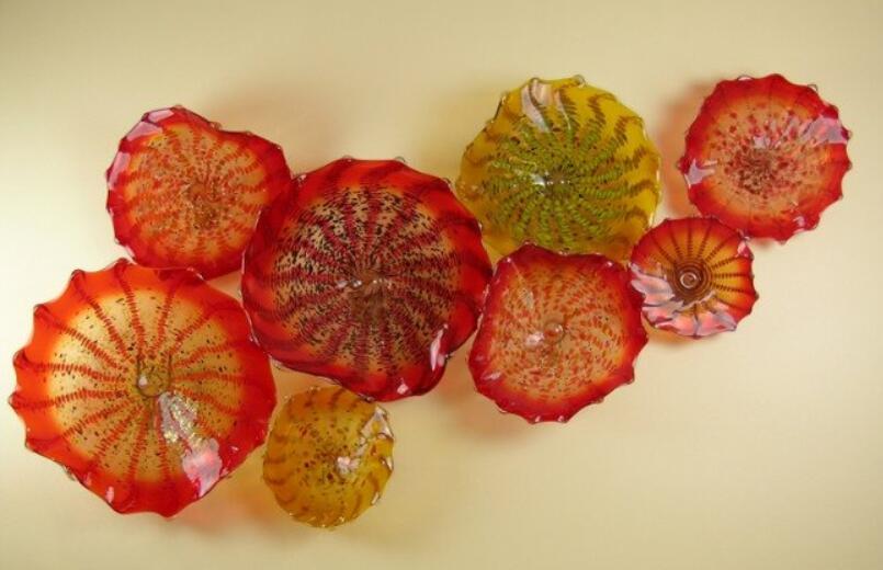 Artistic orange flower plates for modern home decor - Murano glass wall art featuring hanging floral designs