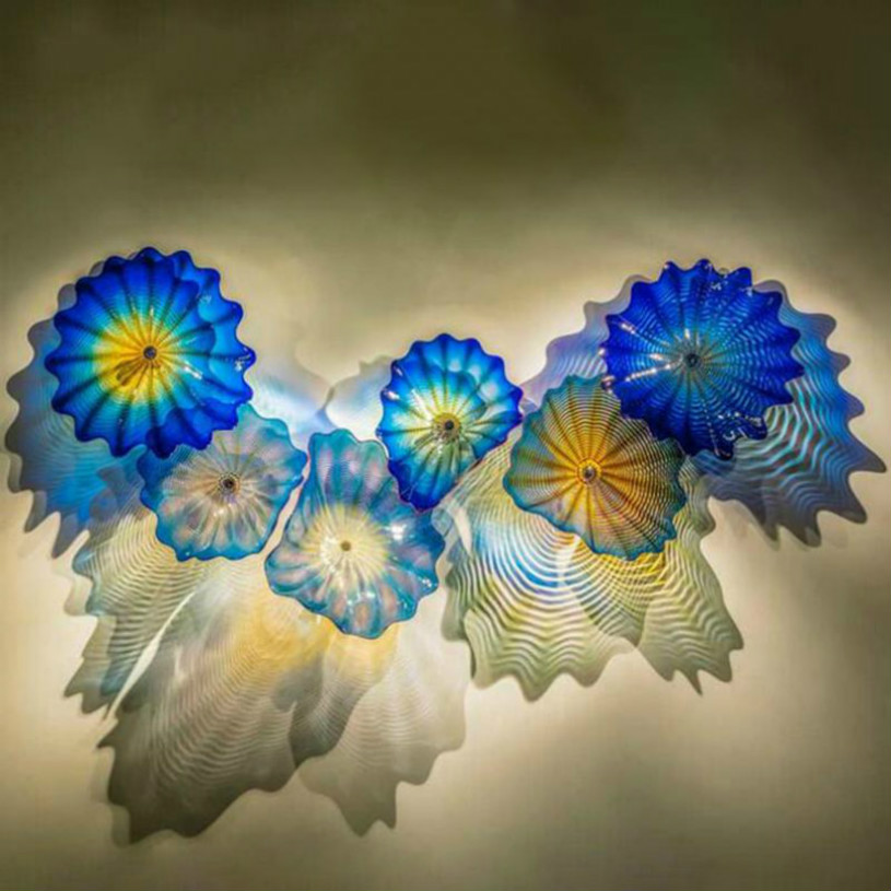 Blue Murano glass plate sconce with floral art, Nordic-style wall decor for living spaces