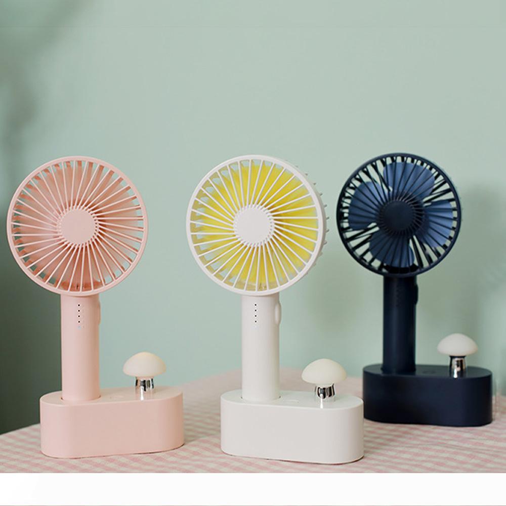BRELONG compact mushroom-shaped fan with night light, USB rechargeable for home or desk use in white, blue, and pink