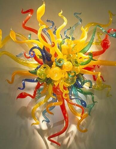 Brightly colored custom Murano glass wall sconces with LED lighting for home decor, designed in Italy