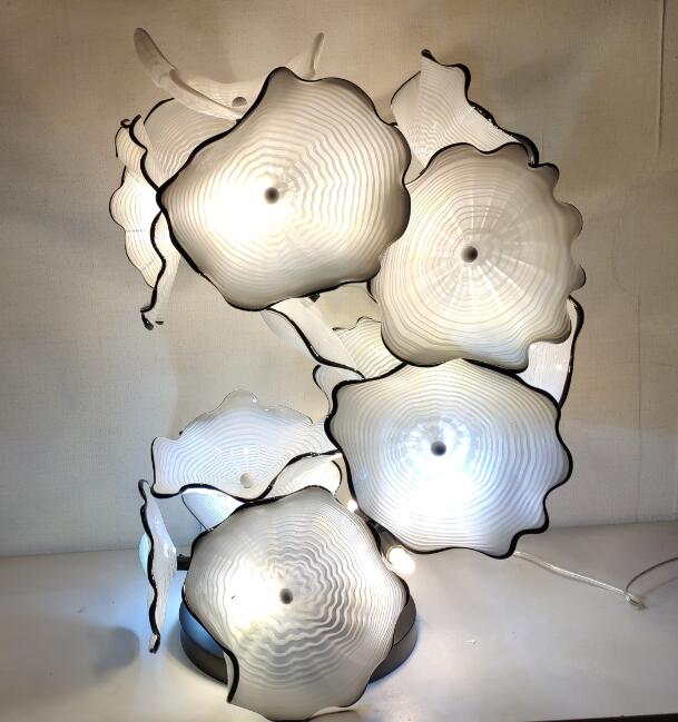 Contemporary Murano glass floor lamps featuring floral designs, crafted as artistic sculptures in white for modern decor