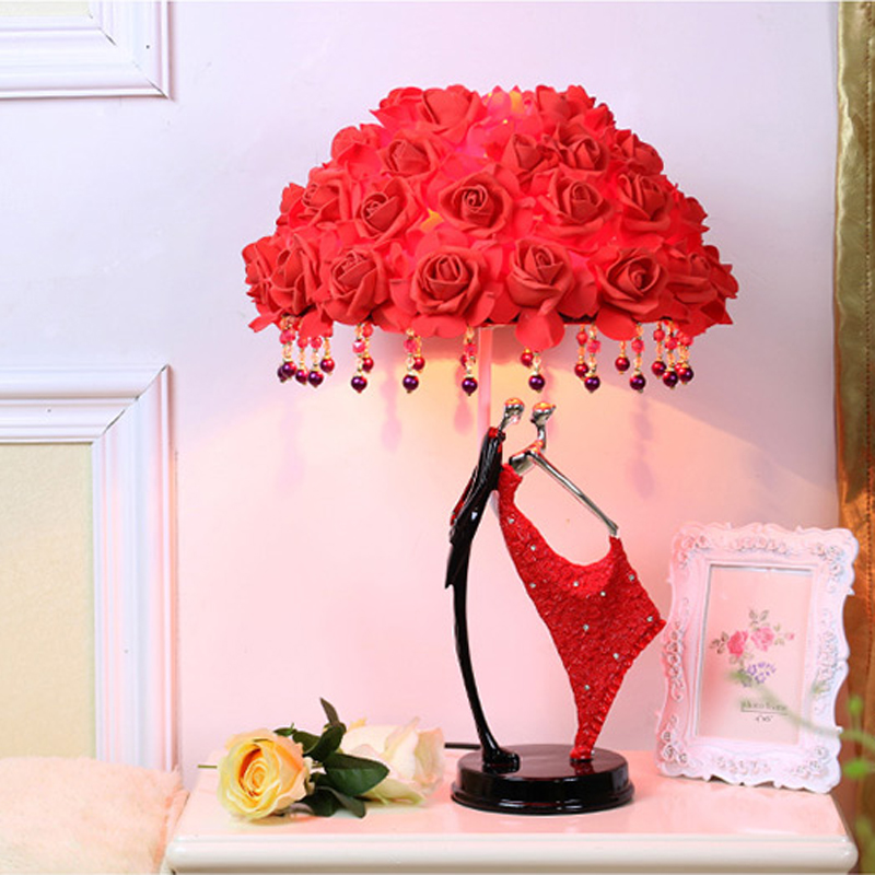 Creative romantic LED table lamp with red roses, perfect for wedding gifts and bedroom decor