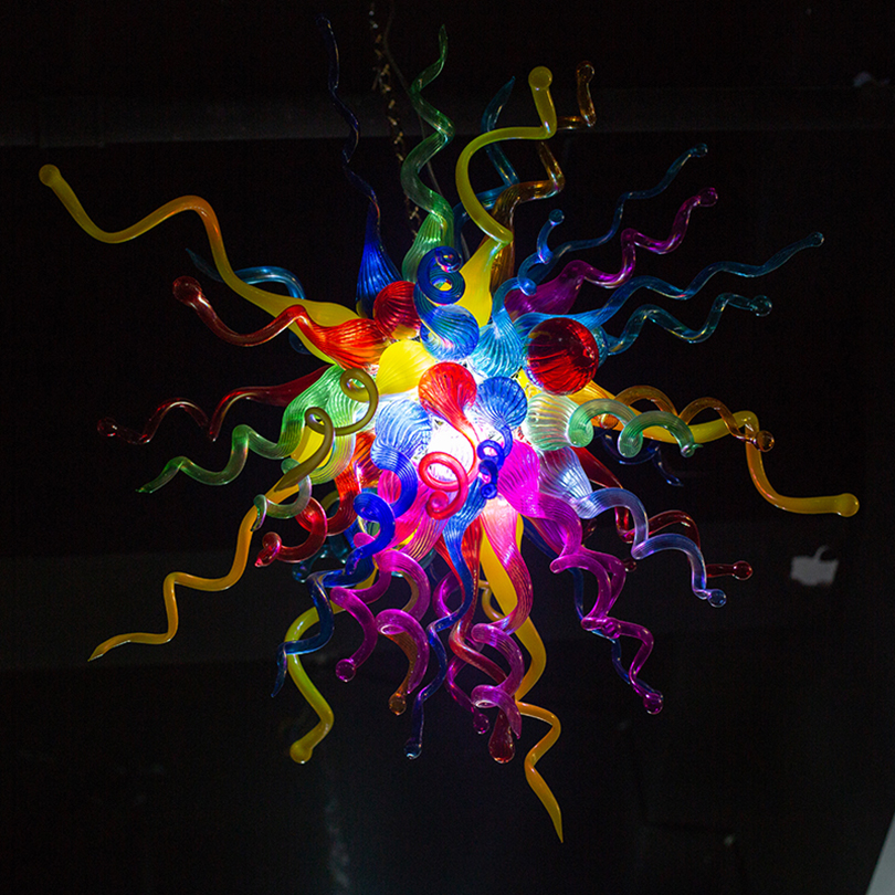 Elegant contemporary Murano glass chandeliers featuring vibrant handcrafted pendant lighting