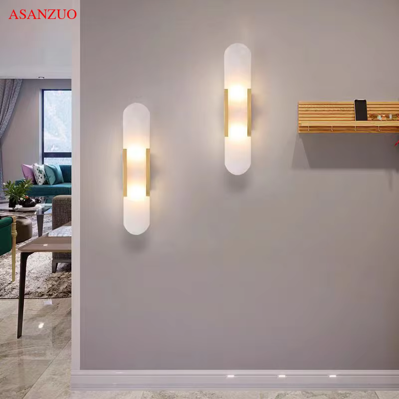 Elegant jade and marble wall lamp with modern gold finish for home decoration