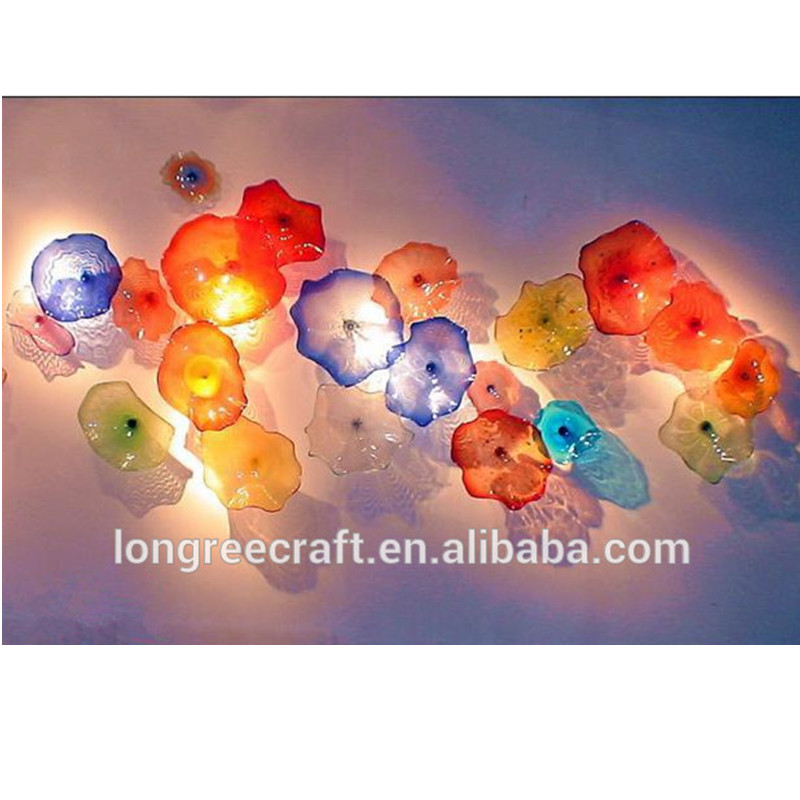 Fancy multicolored Murano glass wall lamps with decorative plates for festive Christmas art design