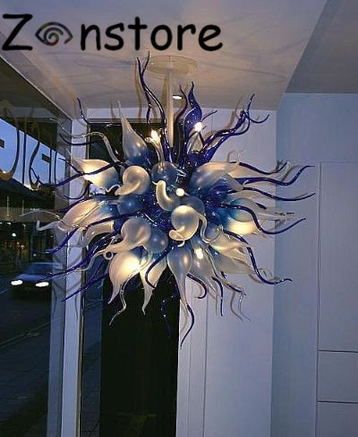 Fashionable cobalt flower pendant lights with crystal accents, a modern LED chandelier for kitchens and living spaces, crafted from hand-blown glass in a compact size