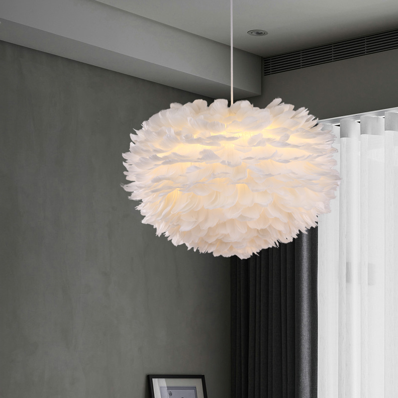 Feather pendant lamps for modern minimalist living and dining spaces, offering warm lighting ideal for creative bedrooms and children's rooms
