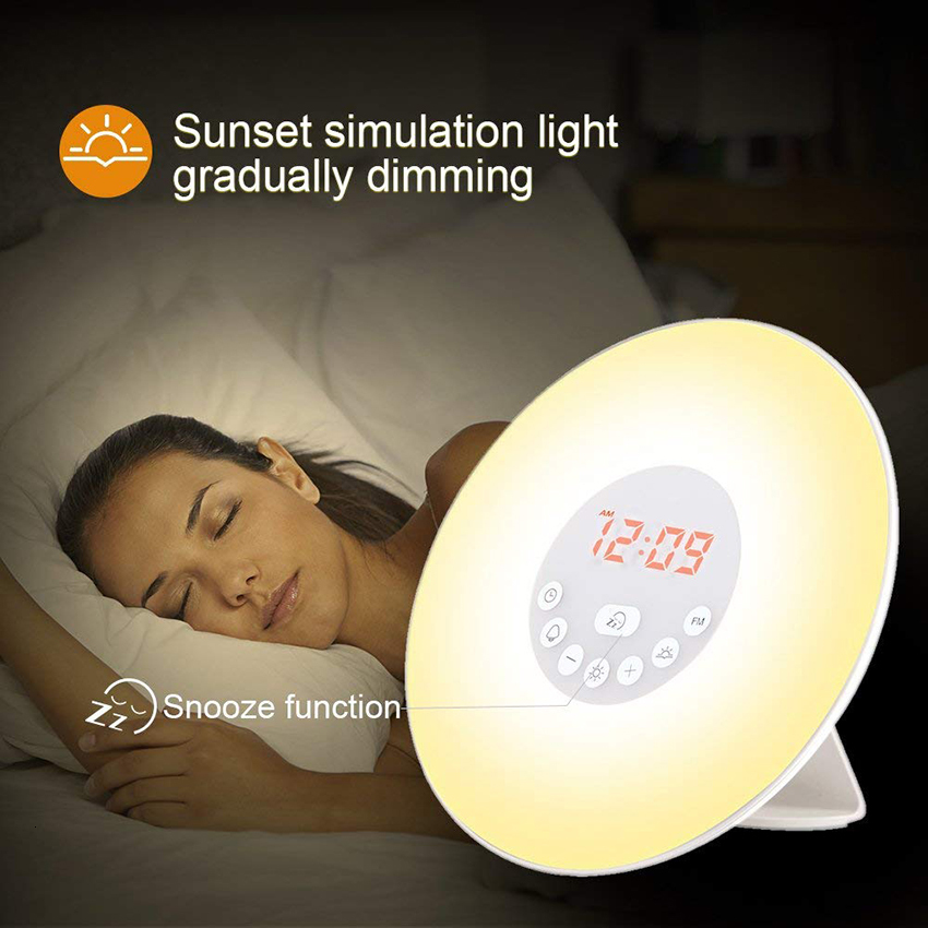 FM radio alarm clock with sunrise simulation and LED time display for bedside use