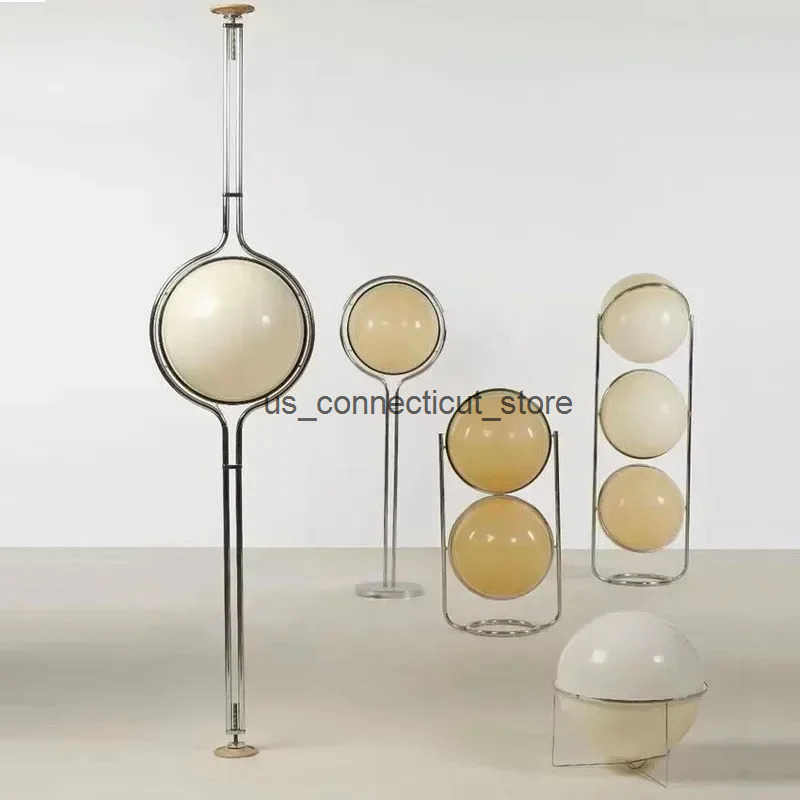 Garrault Delord's elegant white acrylic ball floor lamp, perfect for living rooms, dining areas, hotels, sofas, and study spaces
