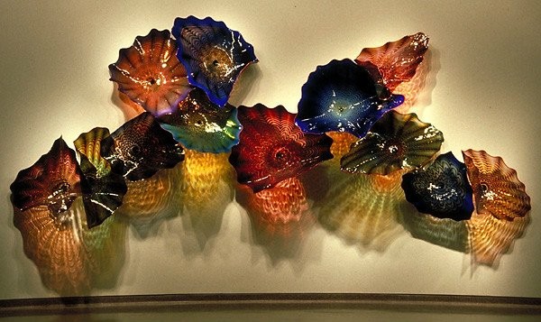 Glass wall plates featuring hanging Murano floral art, mounted dish lamps for home, hotel, or museum decoration