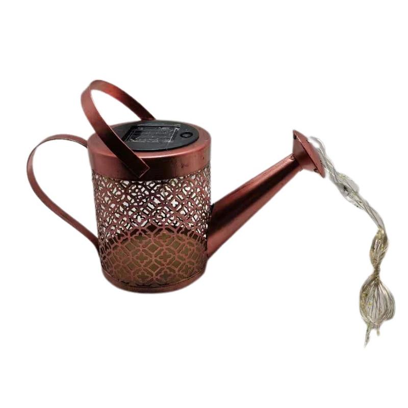 H7JB solar-powered star garden lights with hollow iron kettle design and LED sprinkler feature