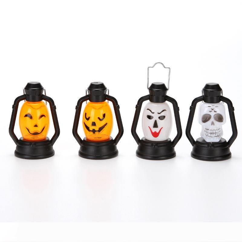 Halloween LED pumpkin lantern with colorful hanging ghost and skull designs for party decor
