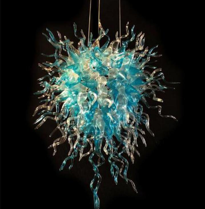 Handcrafted blue glass pendant chandeliers with modern Art Deco style and LED lighting for contemporary home interiors