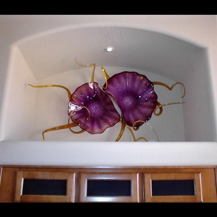Handcrafted glass plates for elegant wall decor and modern floral lamp designs