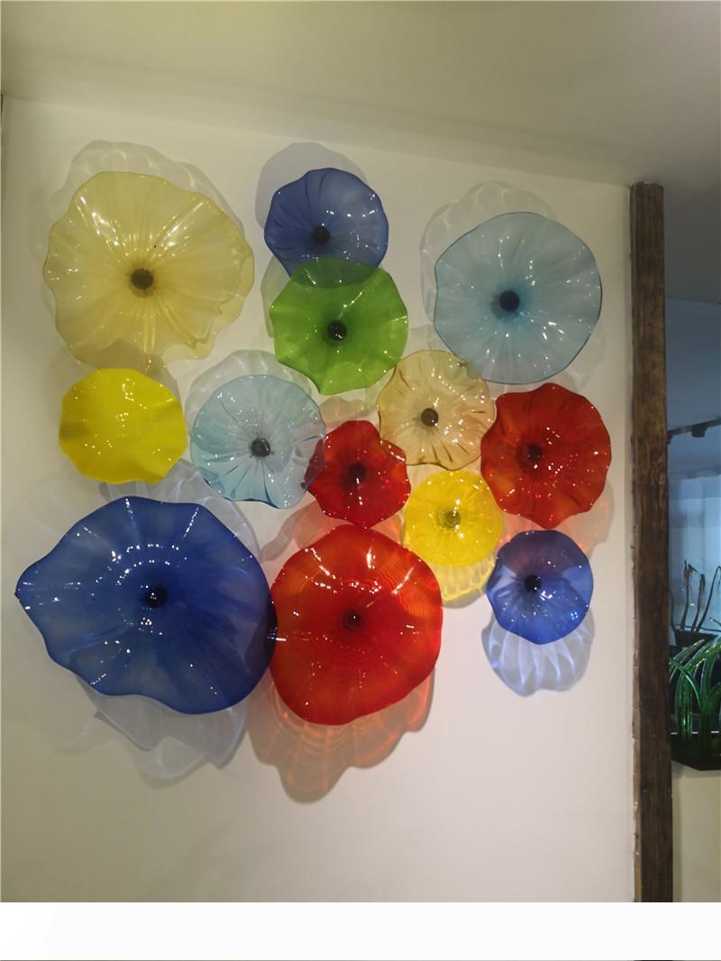 Handcrafted Italian Murano glass wall plates with decorative lighting and custom designs