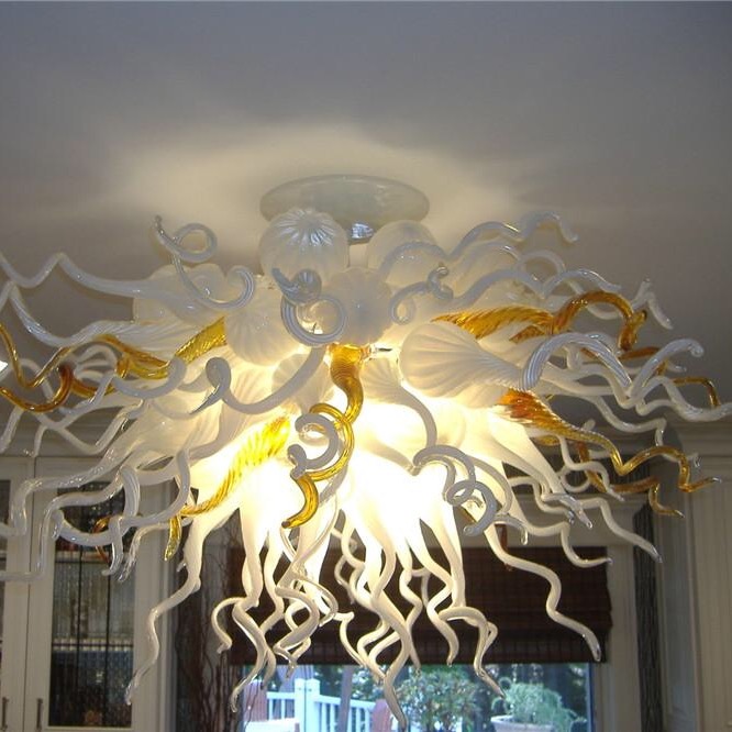 Handcrafted Murano glass ceiling lights in white and amber tones, featuring LED illumination for residential and commercial spaces