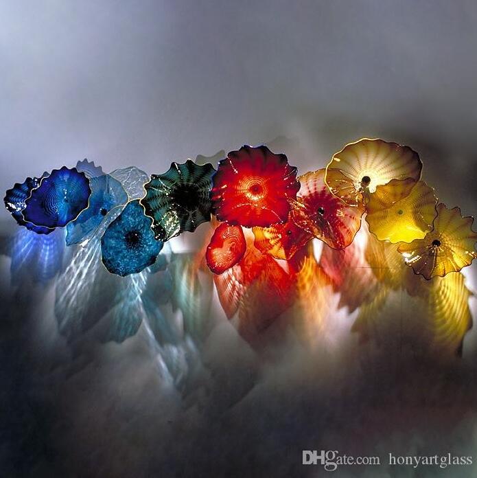 Handcrafted Murano glass wall lamps featuring vibrant yellow and blue art plates, ideal for home, villa, or fireplace decoration
