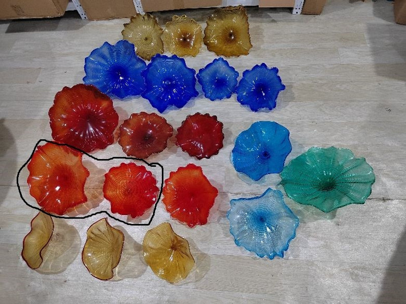 Handcrafted Murano glass wall plates and lamps in floral designs, custom-made