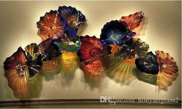 Handcrafted Murano glass wall plates for wholesale, ideal for hotel decor in custom colors and sizes