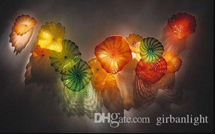 Handcrafted Murano glass wall plates with modern art lamp designs, made in Italy