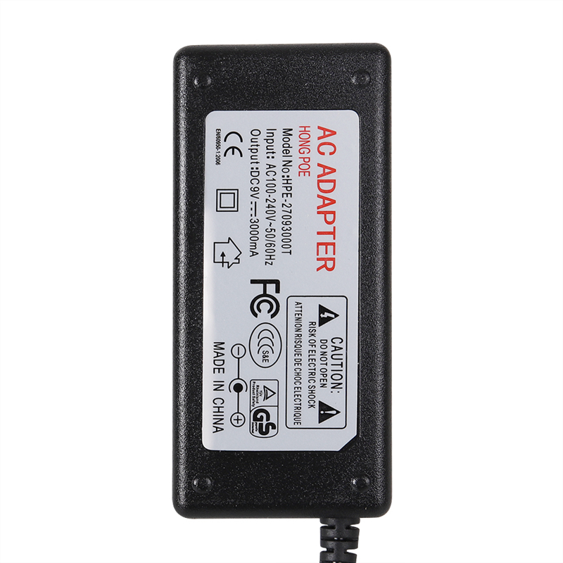 High-quality 9V 3A power supply with AC 100-240V input and DC 9V 3A output, featuring 5.5x2.1mm connector and US/UK plugs