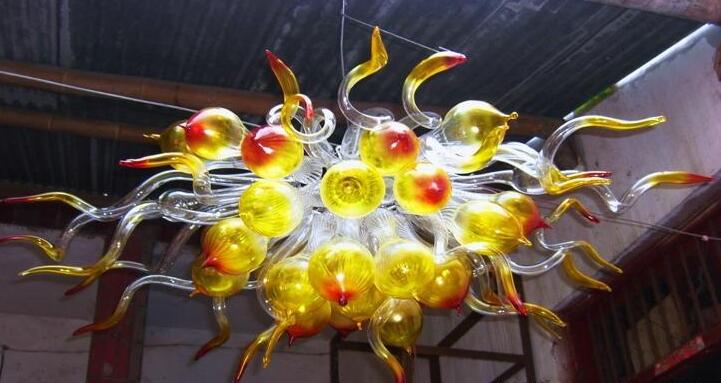 Italian Bubble Chandelier featuring hand-blown art glass crystals, a stylish and affordable lighting option for foyers and hotel lobbies