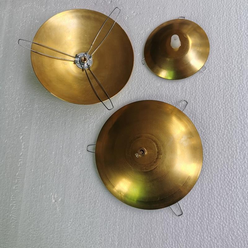 Lamp shades and covers ranging from 80-180mm, featuring brass cap arc trays with three-prong forks and galvanized spring clips for secure lighting fixture attachment