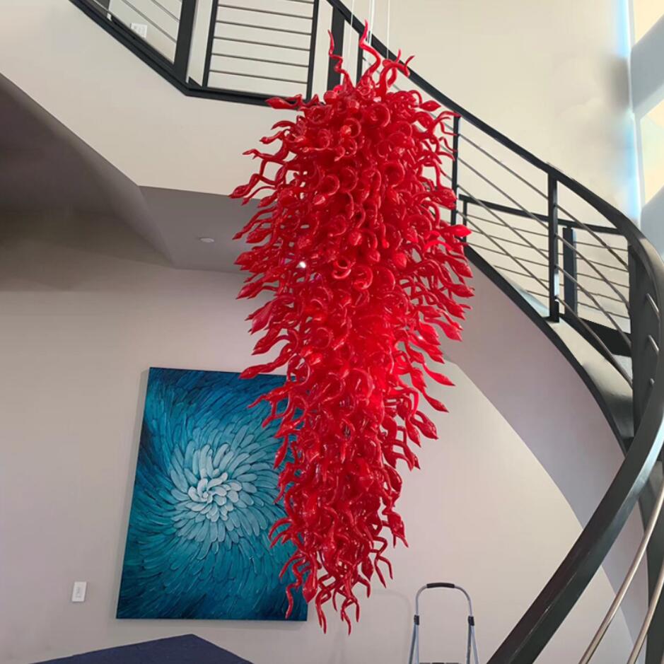 Lamps Boutique Hotel offers exquisite handcrafted red glass chandeliers, including large spiral crystal pendant lights now on sale