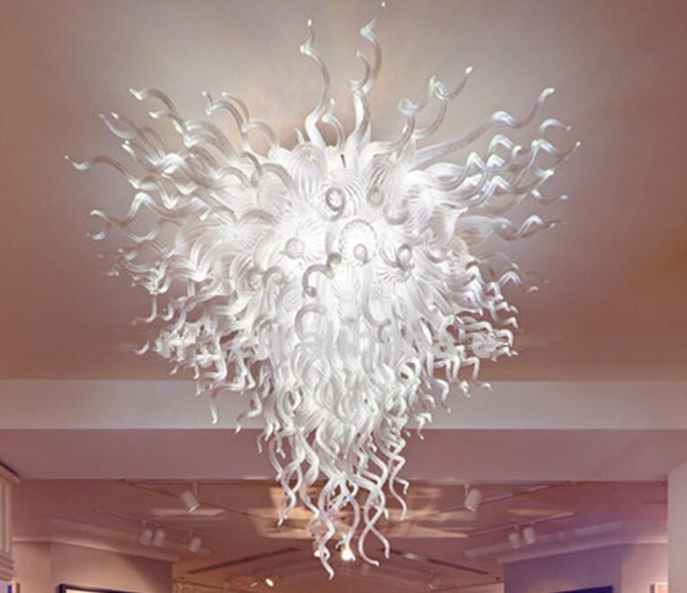 Lamps Hotel's handcrafted glass chandeliers feature modern LED ceiling lights for stylish home decor