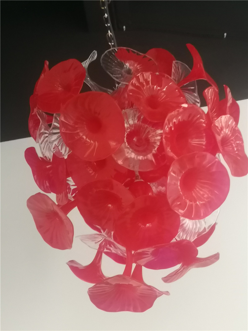Lamps Villa's decorative pendant lighting features a red shade, ideal for weddings and Christmas decor, crafted from hand-blown glass