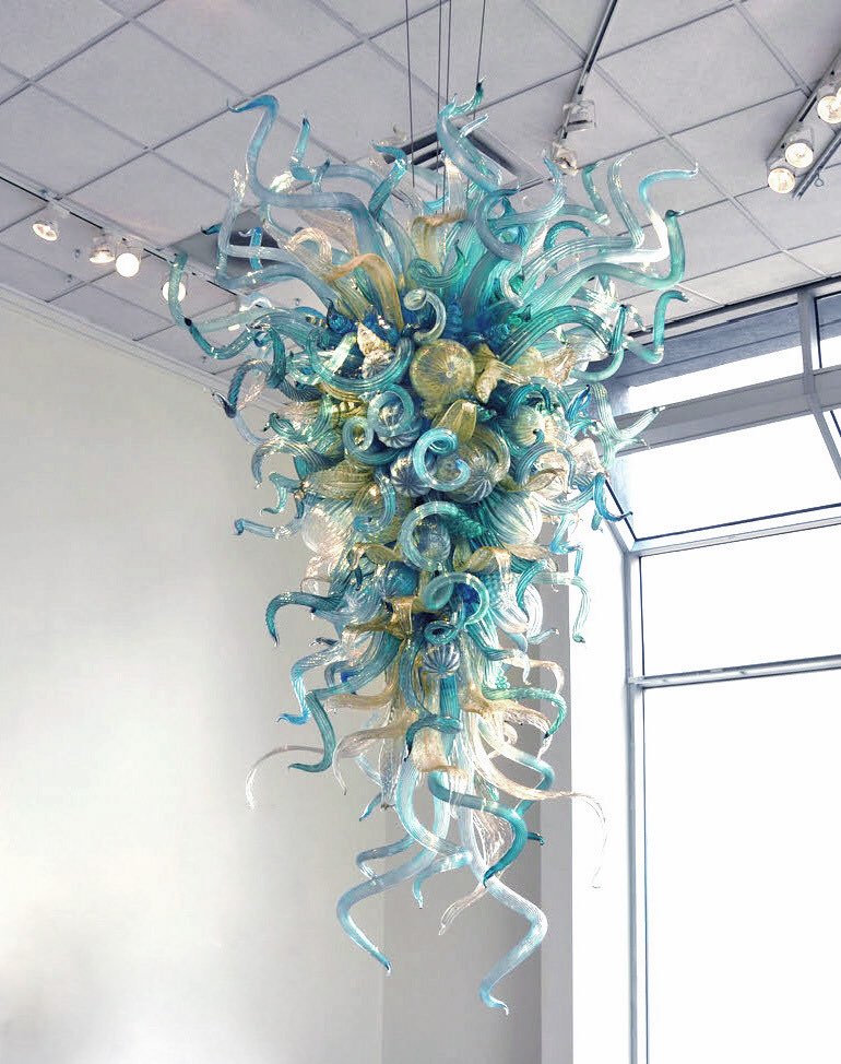 Large elegant Murano glass chandeliers in classic chandelier designs for living spaces, dining areas, bars, bedrooms, and studies