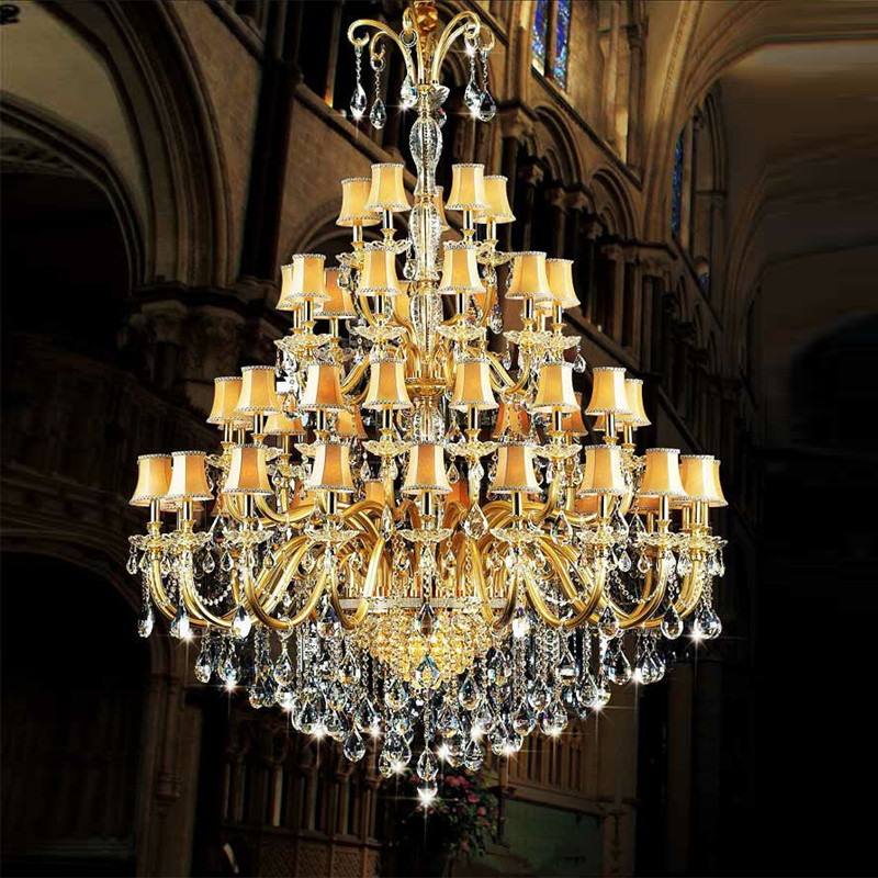 large fabric-covered gold crystal hotel chandelier with glass arms for modern banquet halls and staircases