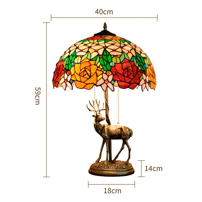 LED Tiffany table lamp with handcrafted stained glass featuring elk and rose designs, perfect for living rooms, bedrooms, or bedside tables