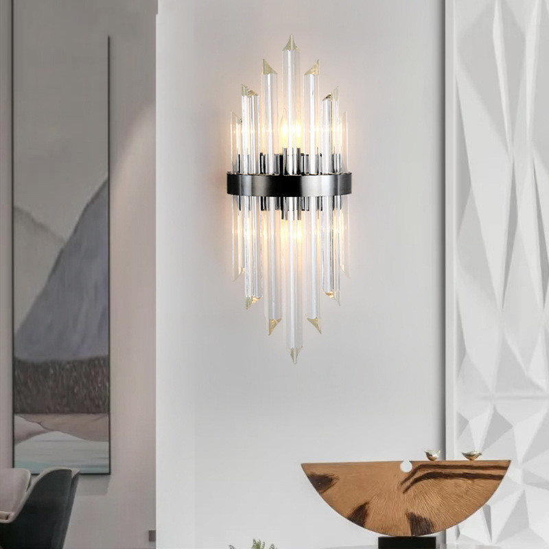 Luxurious gold wall sconce with modern crystal accents, ideal for living spaces or bedside, featuring stainless steel and LED lighting