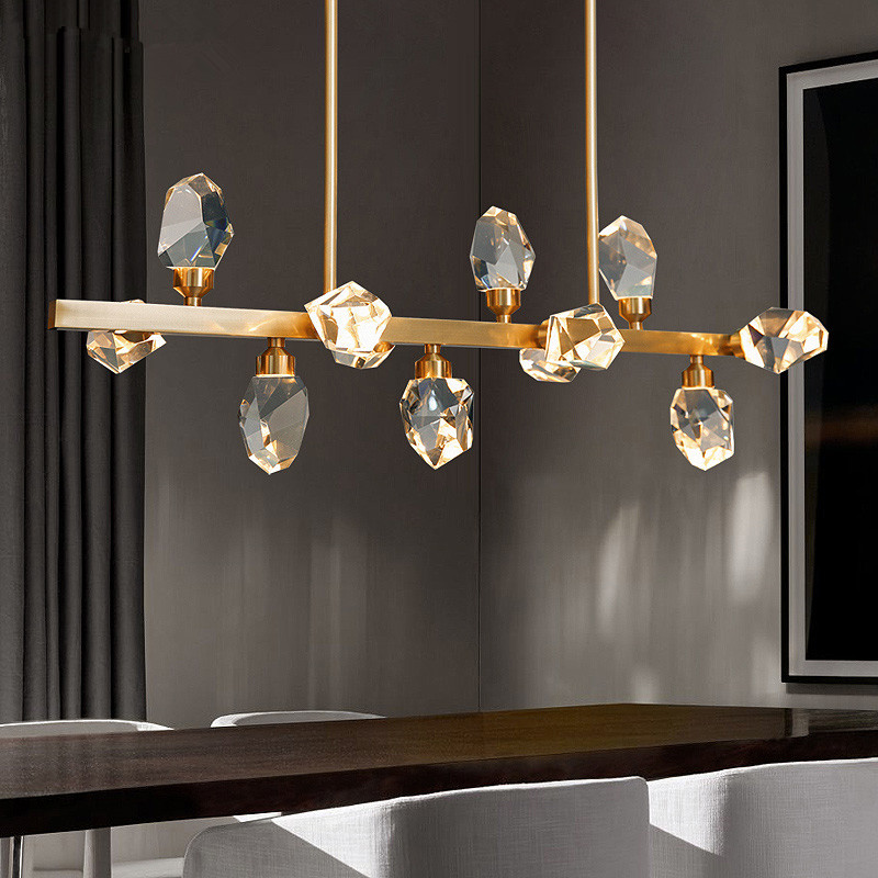 Luxury crystal pendant chandeliers for dining rooms, brass bedroom lighting, and stylish LED kitchen fixtures with copper accents