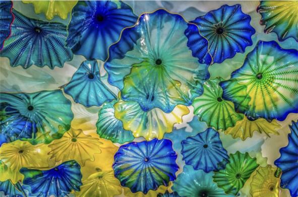 Mediterranean-style handcrafted blown glass floral wall plates in multicolor Murano art