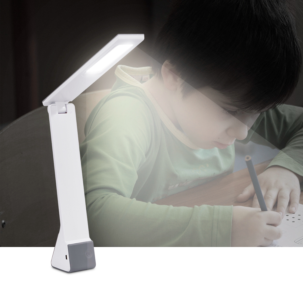 Modern adjustable LED desk lamp with touch control, USB charging, and foldable design for reading and bedroom use