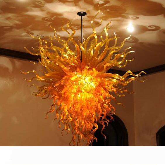 Modern amber glass pendant lights for elegant hotel and home decor, featuring handcrafted blown glass with LED chandelier lighting