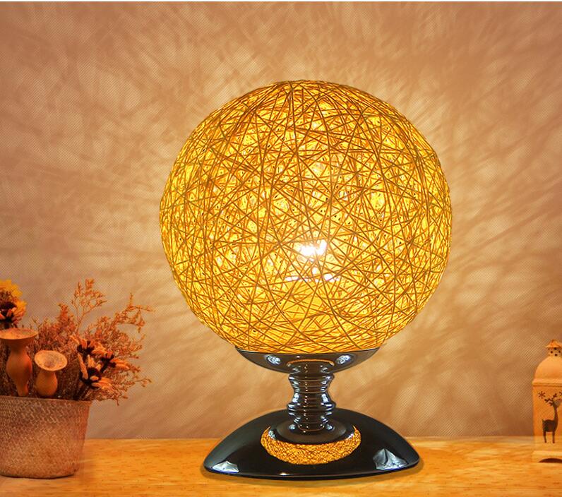 Modern Art Deco-inspired LED table lamps with customizable cotton shades, perfect for home, bar, or hotel decor
