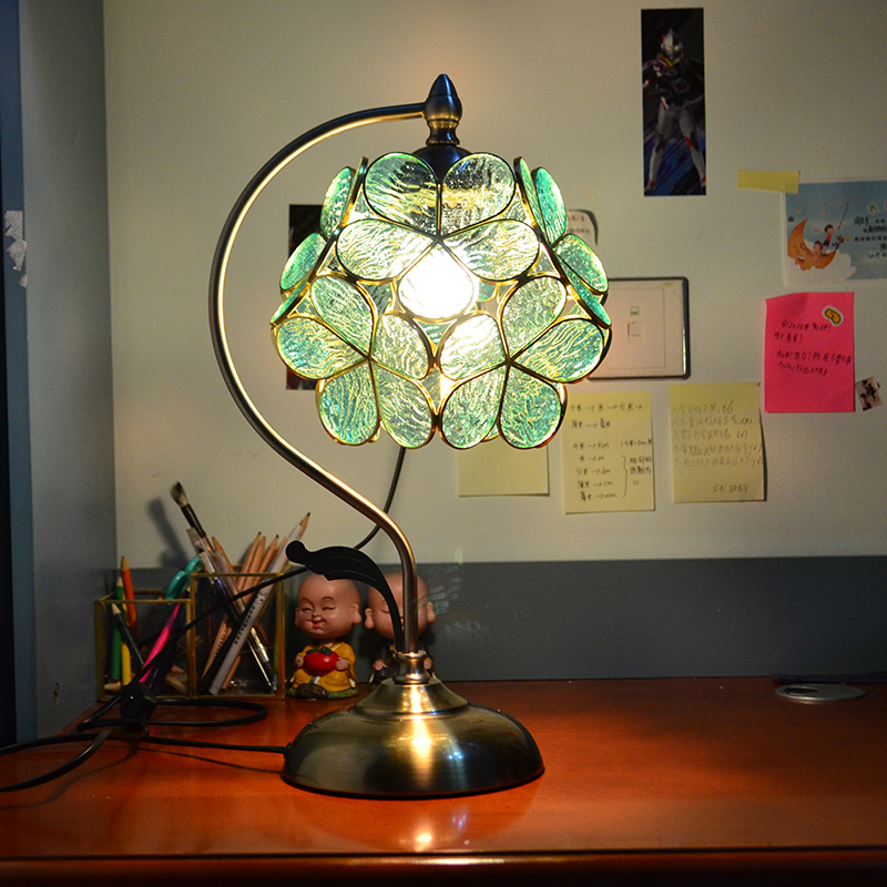 Modern bedside lamps with eye protection, stylish desk lights featuring Tiffany glass petal designs, retro-inspired indoor lighting perfect for coffee shop decor
